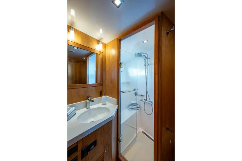 Slide: The Image of Luxurious bathroom in 2026 Kadey-Krogen 60 Open yacht with modern shower and vanity. - 42