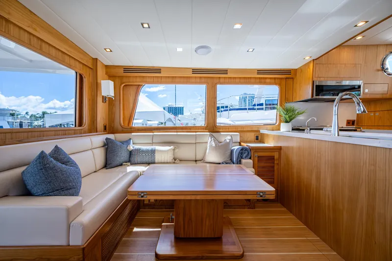 Slide: The Image of Luxurious interior of 2026 Kadey-Krogen 60 Open yacht with elegant wood finishes. - 5