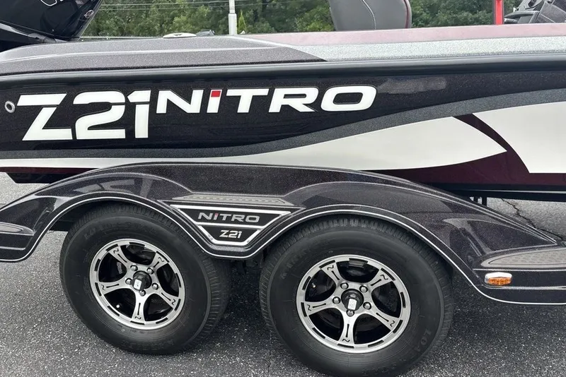 Slide: The Image of 2021 Nitro Z21 boat trailer with dual wheels and sleek design. - 45
