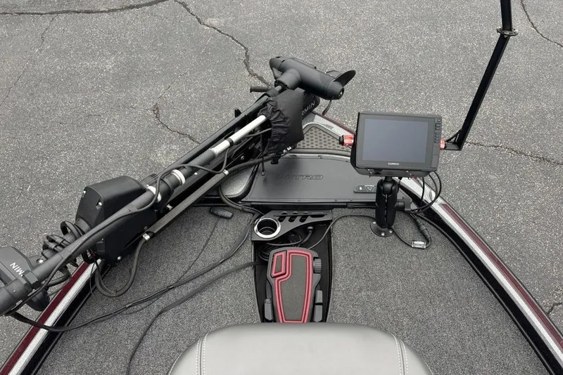 Slide: The Image of 2021 Nitro Z21 boat dashboard with Garmin fishfinder and Minn Kota trolling motor. - 16