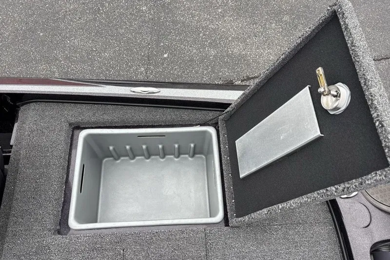 Slide: The Image of Open storage compartment in 2021 Nitro Z21 boat, featuring a spacious interior. - 35