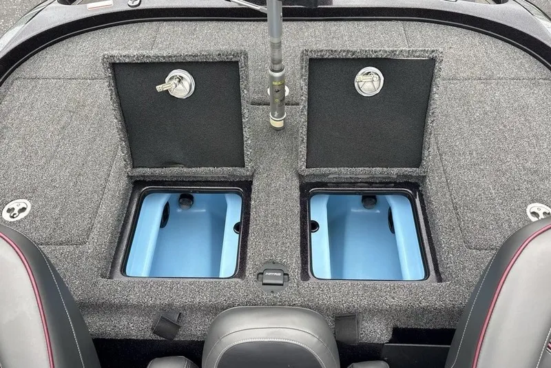 Slide: The Image of 2021 Nitro Z21 boat storage compartments with open lids, showcasing interior design. - 33