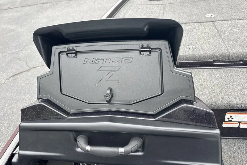 Slide: The Image of 2021 Nitro Z21 boat storage compartment with handle and latch. - 36