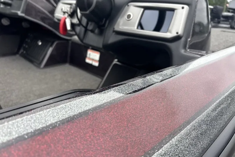 Slide: The Image of Interior view of a 2021 Nitro Z21 boat, featuring sleek dashboard and controls. - 43