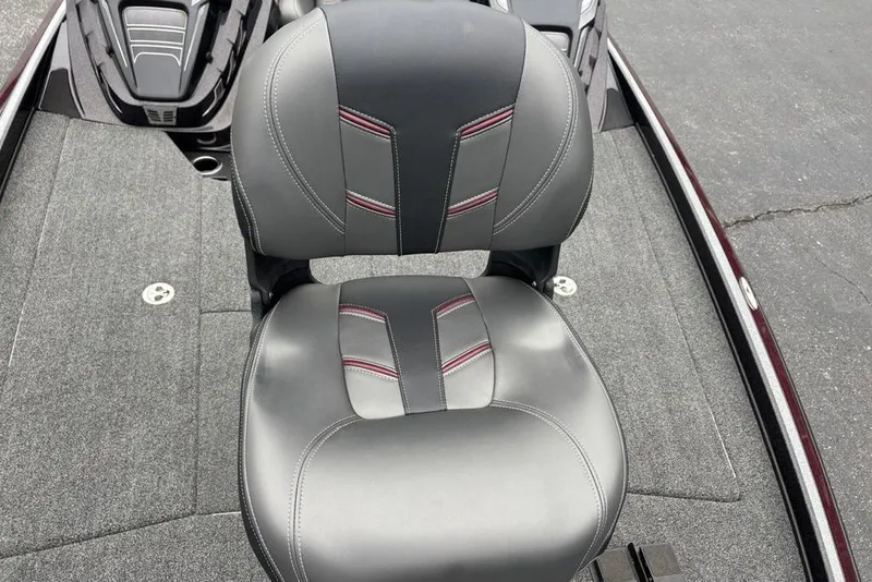Slide: The Image of Gray leather seat on a 2021 Nitro Z21 boat, featuring red accents. - 25