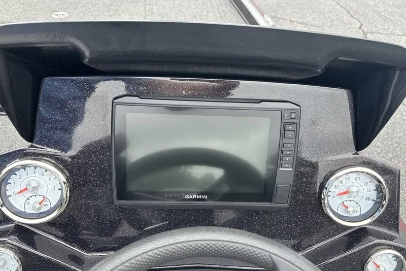Slide: The Image of Dashboard of a 2021 Nitro Z21 boat featuring Garmin display and gauges. - 29