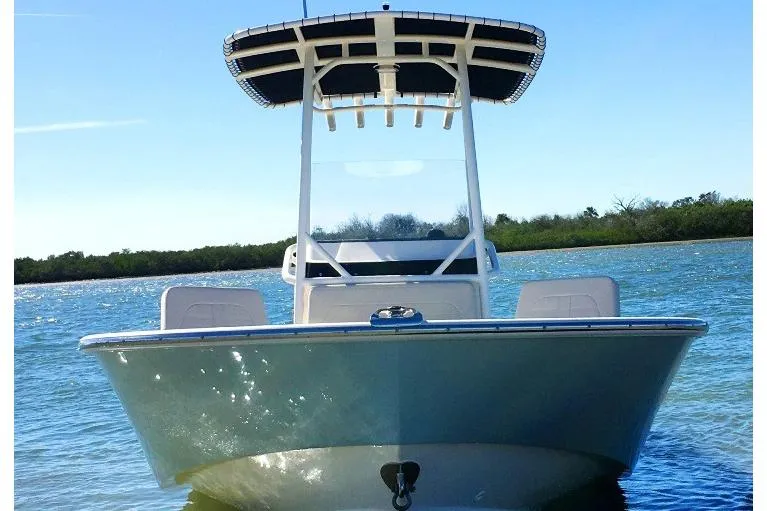 Slide: The Image of Manufacturer Provided Image: 2023 Boston Whaler 210 Montauk boat on calm water. - 16