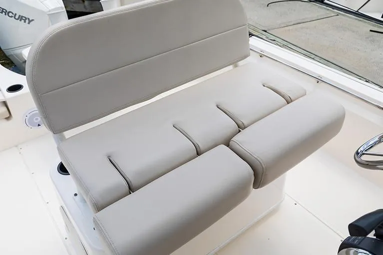 Slide: The Image of Manufacturer Provided Image: 2023 Boston Whaler 210 Montauk boat seat with beige upholstery. - 20