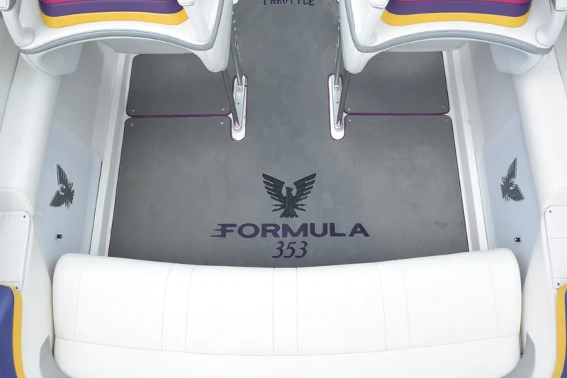 Slide: The Image of Interior view of a 2006 Formula 353 FASTech boat with logo on the floor. - 14