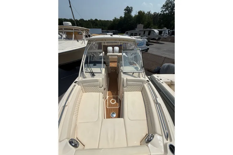 Slide: The Image of 2024 Grady-White Freedom 285 boat with spacious seating and elegant design. - 20