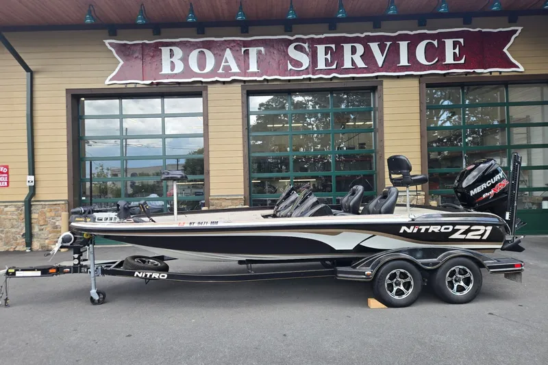 The Image of 2016 Nitro Z21 boat parked outside a boat service center. - 0