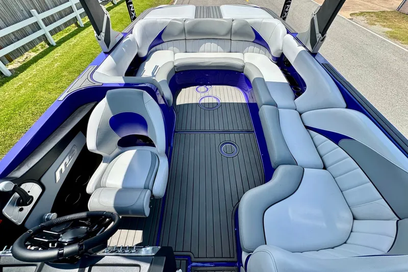 Slide: The Image of 2018 MB F24 Tomcat boat interior with luxurious seating and sleek design. - 8