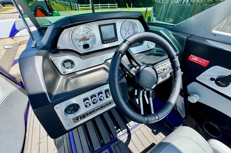 Slide: The Image of Dashboard of 2018 MB F24 Tomcat boat with steering wheel and gauges. - 16