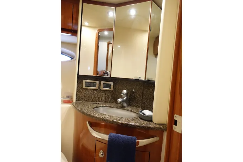 Slide: The Image of Luxurious bathroom interior of 2006 Sea Ray 44 Sundancer yacht with granite countertop. - 47