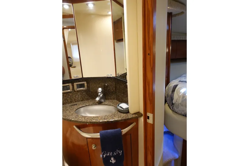 Slide: The Image of Luxurious bathroom interior of 2006 Sea Ray 44 Sundancer yacht with granite countertop. - 43