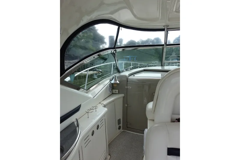 Slide: The Image of Interior view of 2006 Sea Ray 44 Sundancer yacht, featuring sleek design and comfortable seating. - 14
