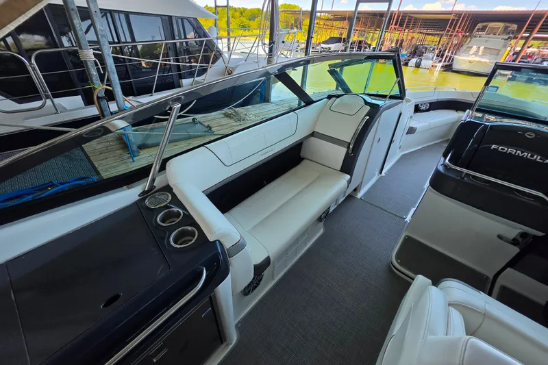 Slide: The Image of 2020 Formula 350 Crossover Bowrider OB interior with luxurious seating and sleek design. - 22