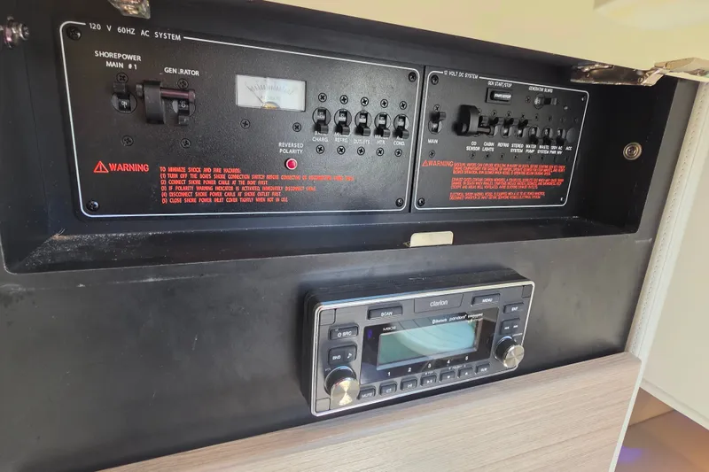 Slide: The Image of Electrical control panel and stereo system in 2020 Formula 350 Crossover Bowrider OB boat. - 41