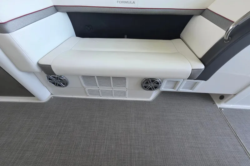 Slide: The Image of 2020 Formula 350 Crossover Bowrider OB interior seating with integrated speakers and vents. - 23