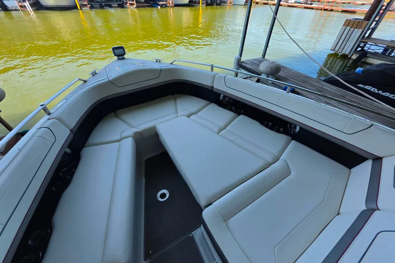 Slide: The Image of 2020 Formula 350 Crossover Bowrider OB interior with spacious seating by the water. - 30