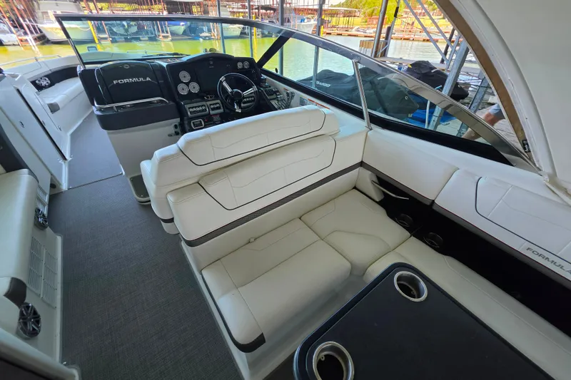 Slide: The Image of 2020 Formula 350 Crossover Bowrider OB interior with luxurious seating and modern dashboard. - 20