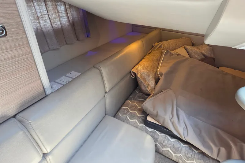 Slide: The Image of Interior cabin of 2020 Formula 350 Crossover Bowrider OB with cozy seating and cushions. - 36