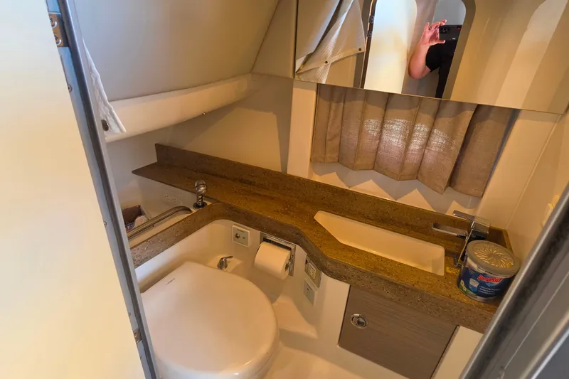 Slide: The Image of 2020 Formula 350 Crossover Bowrider OB bathroom with modern sink and toilet. - 39