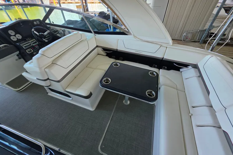Slide: The Image of 2020 Formula 350 Crossover Bowrider OB interior with seating and table, showcasing luxury design. - 18