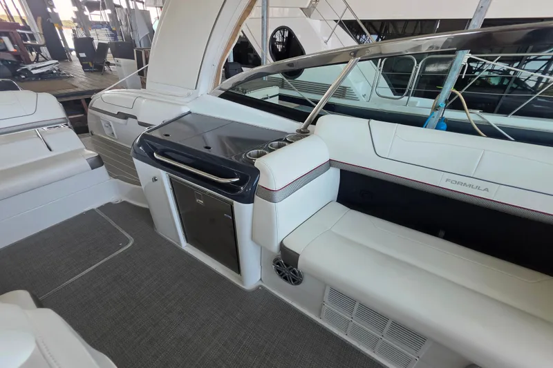 Slide: The Image of 2020 Formula 350 Crossover Bowrider OB interior with white seating and sleek design. - 25