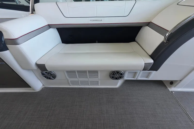 Slide: The Image of 2020 Formula 350 Crossover Bowrider OB interior seating with speakers and modern design. - 24