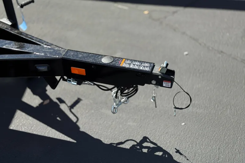 Slide: The Image of Trailer hitch of 2025 Manitou EXPLORE 24 on asphalt surface. - 29