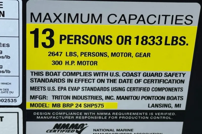 Slide: The Image of Capacity label for Manitou EXPLORE 24, 2025 model, 13 persons or 1833 lbs, 300 HP motor. - 27