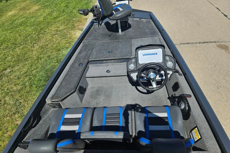 Slide: The Image of 2023 Ranger RT178 boat interior with steering wheel and Lowrance electronics. - 6