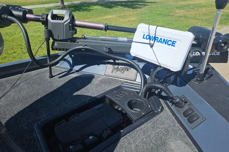 Slide: The Image of 2023 Ranger RT178 boat with Lowrance electronics and trolling motor setup. - 3
