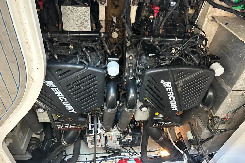 Slide: The Image of Engine compartment of a 2008 Sea Ray Sundancer 330 with twin Mercury engines. - 4