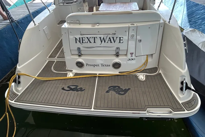 Slide: The Image of 2008 Sea Ray Sundancer 330 boat docked, named "Next Wave," located in Prosper, Texas. - 35