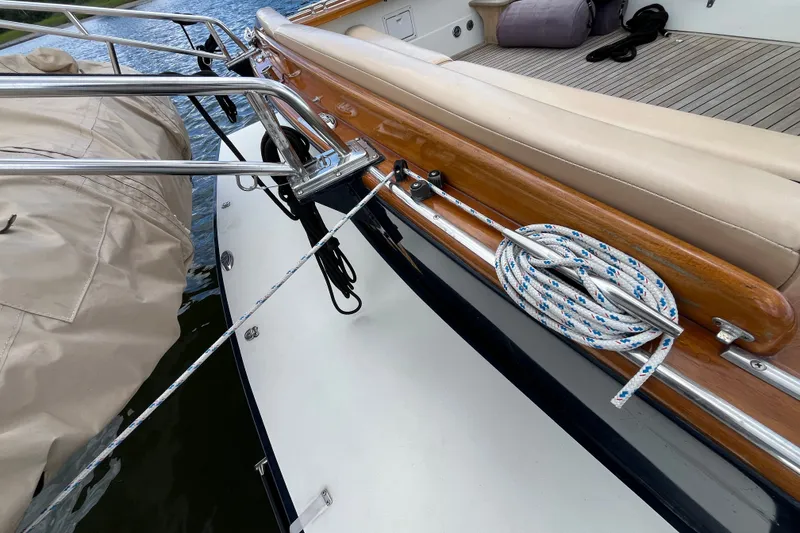 Slide: The Image of 2001 Little Harbor Whisper Jet 38 Prop boat deck with rope and railing details. - 48