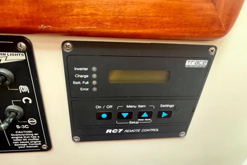 Slide: The Image of Control panel on a 2001 Little Harbor Whisper Jet 38 Prop boat. - 39
