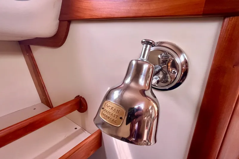 Slide: The Image of Chrome wall light fixture on 2001 Little Harbor Whisper Jet 38 Prop boat interior. - 47