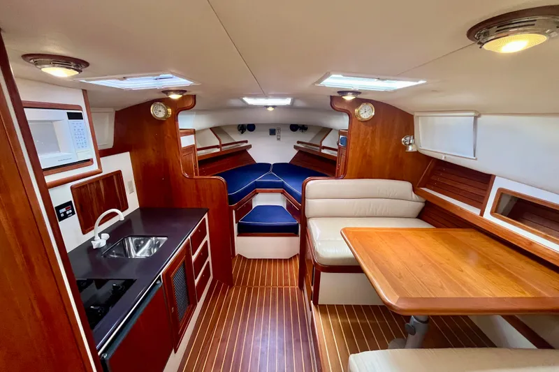 Slide: The Image of Luxurious interior of 2001 Little Harbor Whisper Jet 38 Prop yacht with wood finishes. - 16