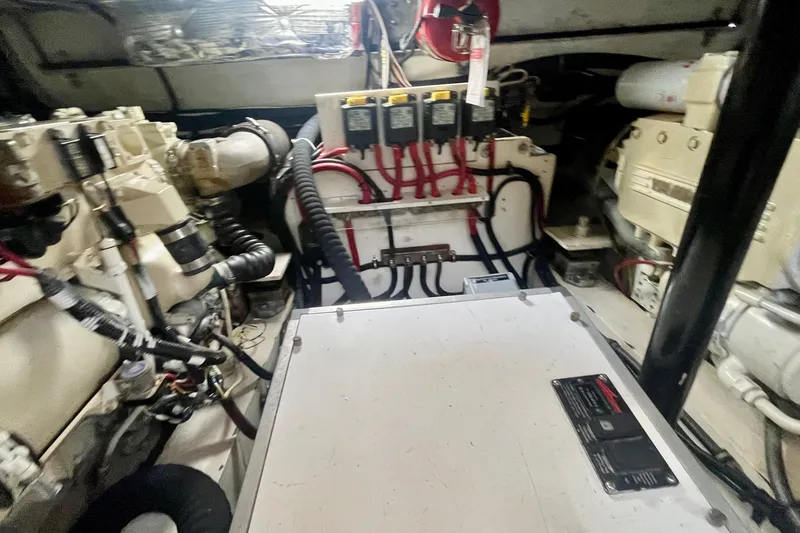 Slide: The Image of Engine room of a 2001 Little Harbor Whisper Jet 38 Prop boat, showcasing mechanical components. - 45