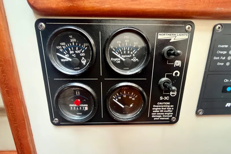 Slide: The Image of Instrument panel of a 2001 Little Harbor Whisper Jet 38 Prop boat. - 38