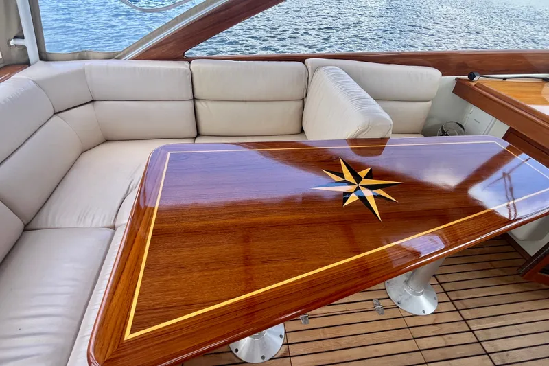 Slide: The Image of Luxurious interior of 2001 Little Harbor Whisper Jet 38 Prop with elegant wood table. - 13