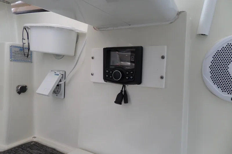 Slide: The Image of Control panel and speaker on 1994 Silverton 34 Aft Cabin Motor Yacht interior. - 21