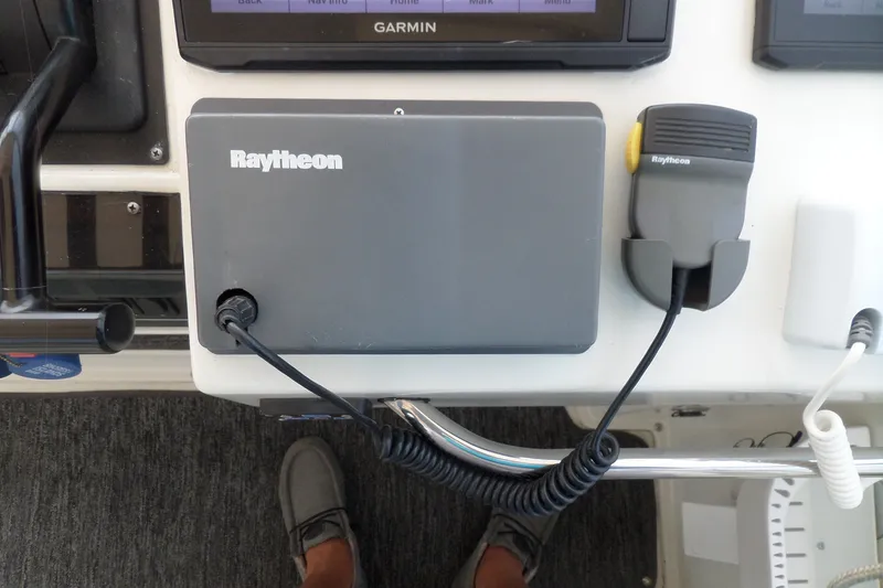 Slide: The Image of Raytheon marine equipment on 1994 Silverton 34 Aft Cabin Motor Yacht dashboard. - 4