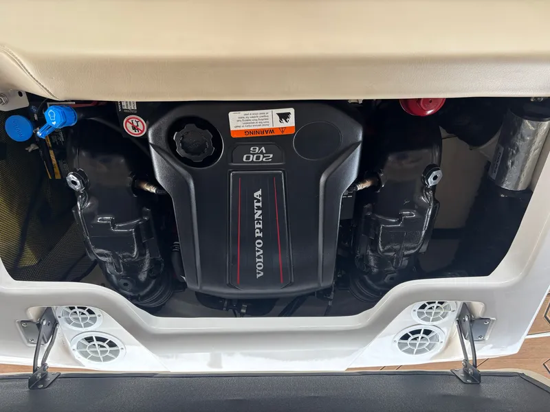 Slide: The Image of The engine compartment of a 2017 Regal 1900 ES Bowrider featuring a Volvo Penta engine. - 17