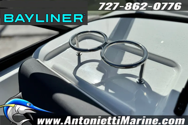 Slide: The Image of Bayliner D22 2026 boat detail with cup holders, contact info, and logo. - 23