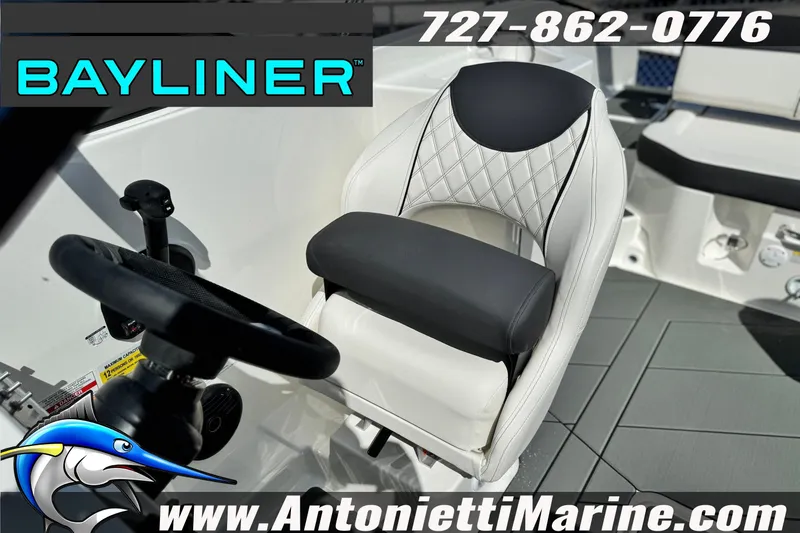 Slide: The Image of 2026 Bayliner D22 boat interior with steering wheel and cushioned seat, Antonietti Marine branding. - 25
