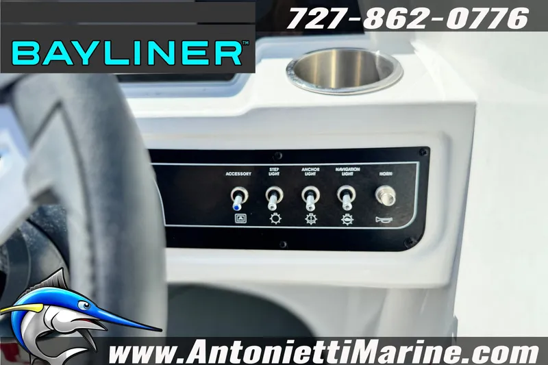 Slide: The Image of Control panel of 2026 Bayliner D22 boat with switches and branding details. - 15