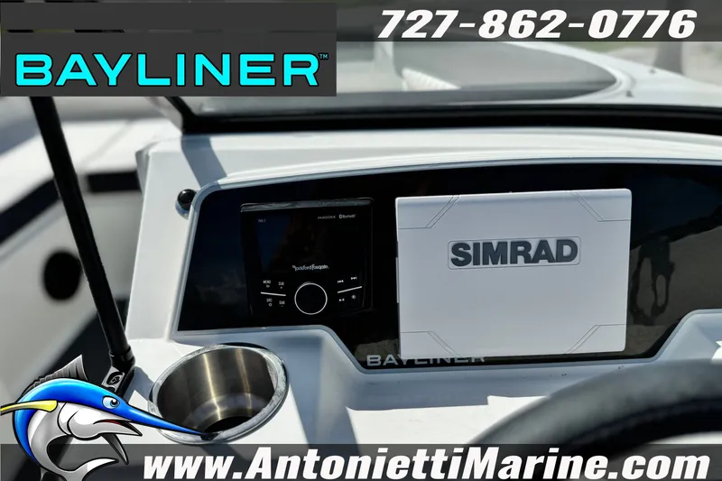 Slide: The Image of 2026 Bayliner D22 dashboard featuring Simrad navigation system and Rockford Fosgate audio controls. - 13